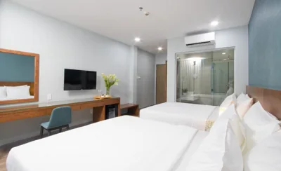 Deluxe Queen Room with Two Queen Beds — PIANO HOTEL